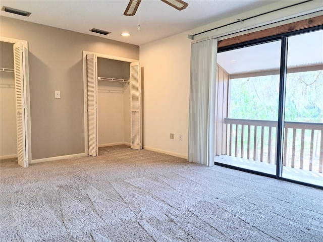 unfurnished bedroom featuring ceiling fan, access to exterior, and light colored carpet