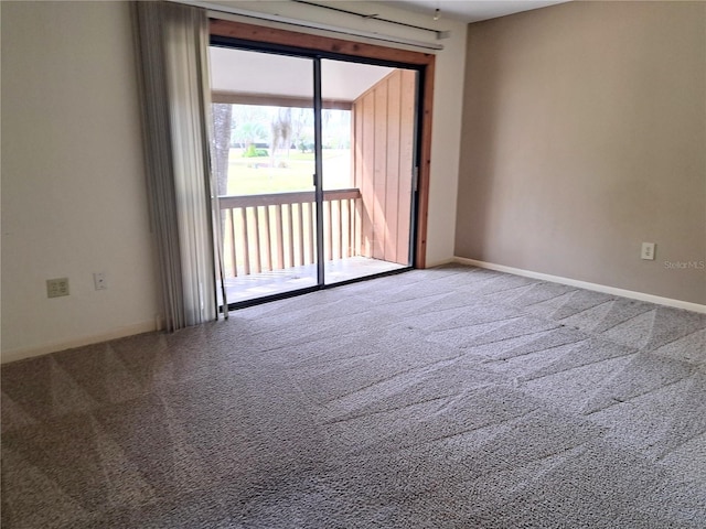 unfurnished room with carpet flooring