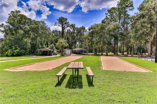 view of home's community featuring a yard