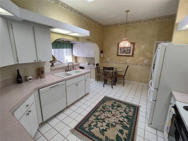 kitchen with white cabinetry, hanging light fixtures, light tile flooring, white appliances, and sink