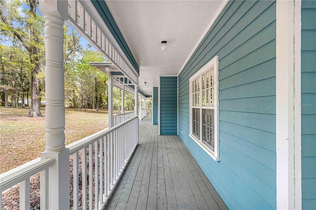 deck with covered porch