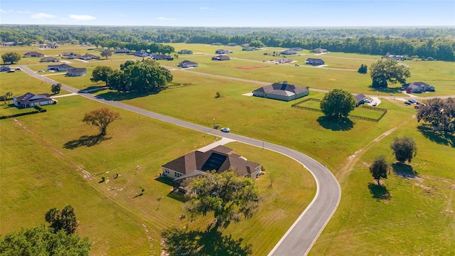 birds eye view of property featuring a rural view