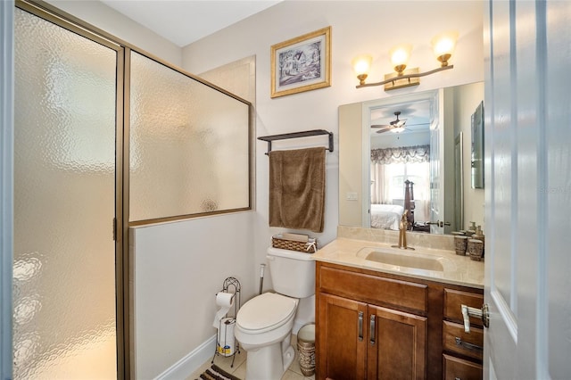 bathroom with toilet, an enclosed shower, ceiling fan, and oversized vanity