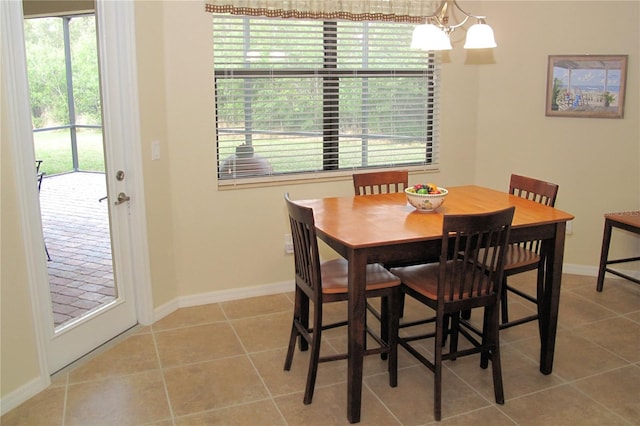 dining room with a chandelier