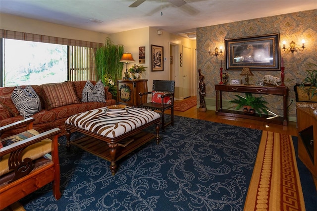 living room with dark hardwood / wood-style floors and ceiling fan