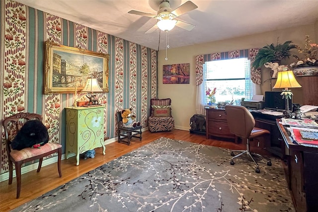 office featuring ceiling fan and hardwood / wood-style flooring