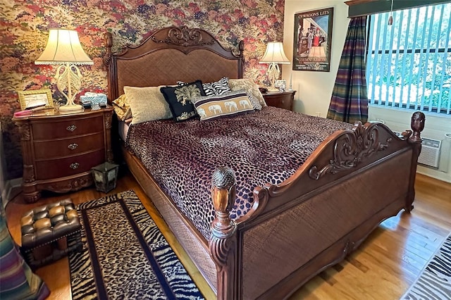 bedroom with light hardwood / wood-style flooring