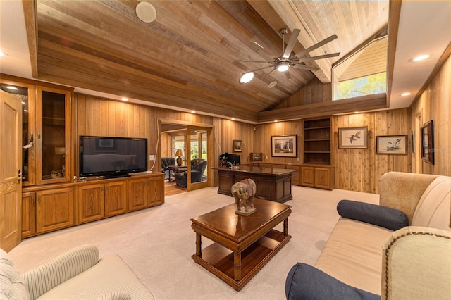 carpeted living room with wood walls, wooden ceiling, and ceiling fan