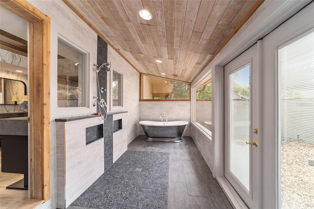 unfurnished sunroom with wood ceiling and vaulted ceiling