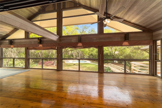 unfurnished sunroom with wooden ceiling, ceiling fan, and vaulted ceiling