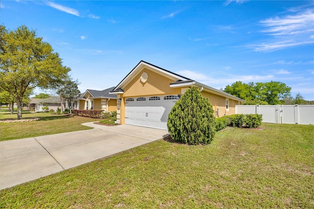 ranch-style home featuring a front lawn and a garage