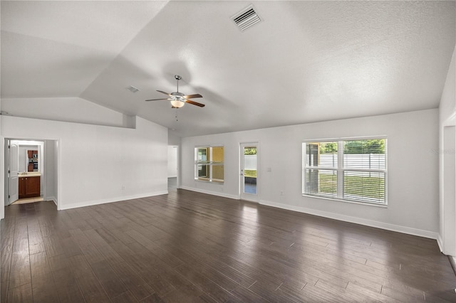 unfurnished living room featuring ceiling fan, dark wood-type flooring, and lofted ceiling