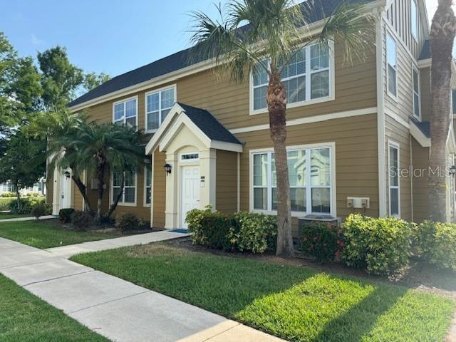 view of front of property with a front lawn