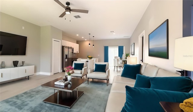 living room featuring ceiling fan