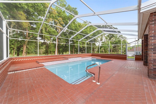 view of pool featuring a lanai and a patio area