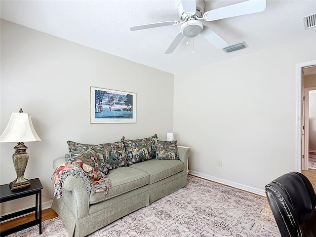 living room featuring ceiling fan