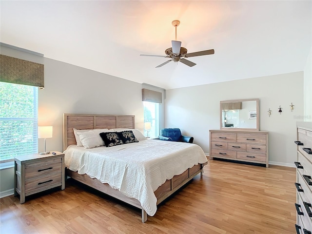 bedroom featuring ceiling fan and light wood-type flooring