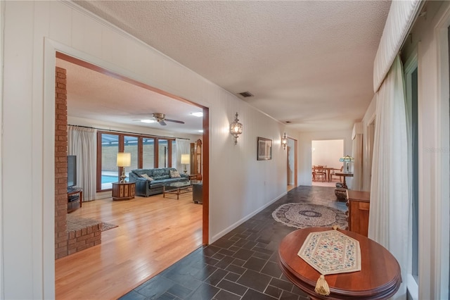 interior space featuring dark hardwood / wood-style flooring and a textured ceiling