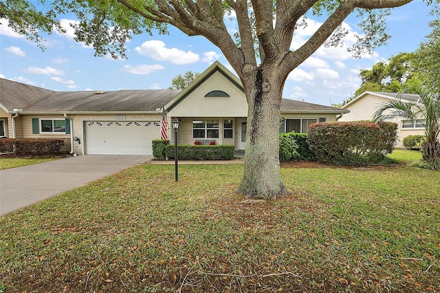 ranch-style house with a front yard and a garage