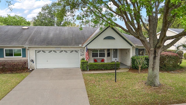 view of front facade featuring a front yard and a garage