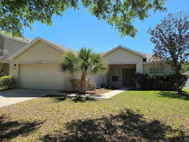 ranch-style house featuring a front lawn and a garage