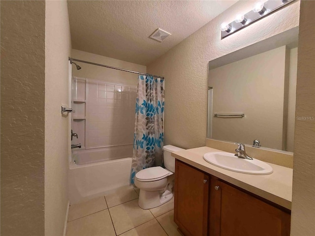 full bathroom with toilet, a textured ceiling, vanity, shower / bath combination with curtain, and tile floors