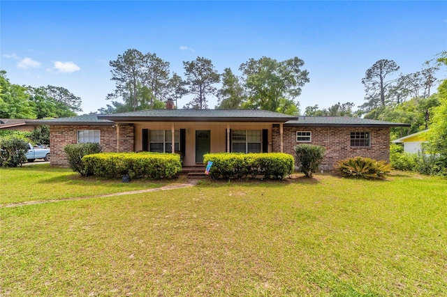 single story home with a front lawn and a porch