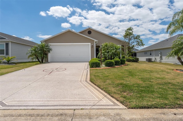 view of front of house featuring a front yard, central AC, and a garage