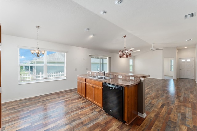 kitchen with ceiling fan with notable chandelier, sink, black dishwasher, and hanging light fixtures