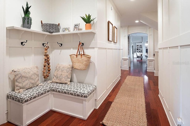 mudroom with dark hardwood / wood-style floors