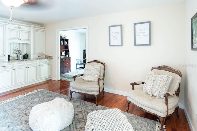 living area featuring hardwood / wood-style floors