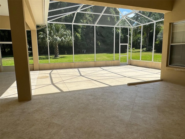 unfurnished sunroom with a swimming pool