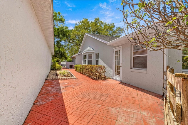 view of property exterior featuring a patio