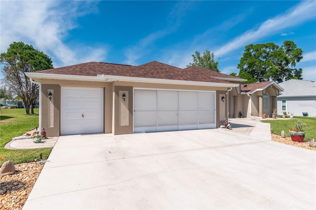 single story home featuring a garage