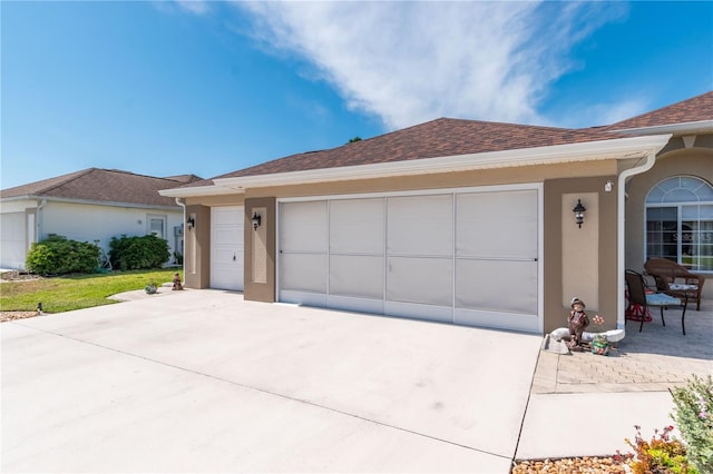 ranch-style home with a garage