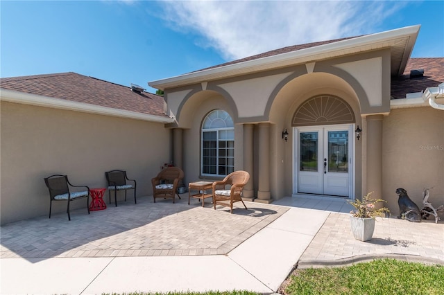 view of terrace featuring french doors