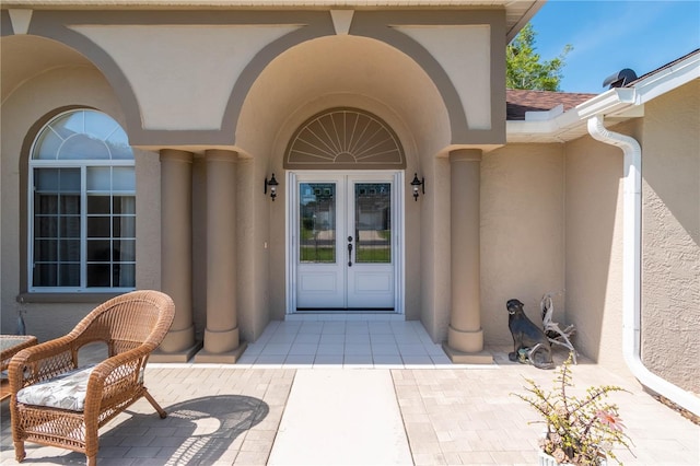 entrance to property featuring french doors