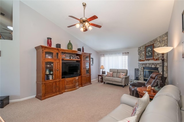 carpeted living room with a fireplace, high vaulted ceiling, and ceiling fan