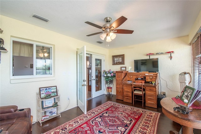 office with french doors, ceiling fan, and dark hardwood / wood-style floors