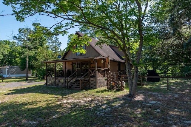 exterior space featuring a front lawn