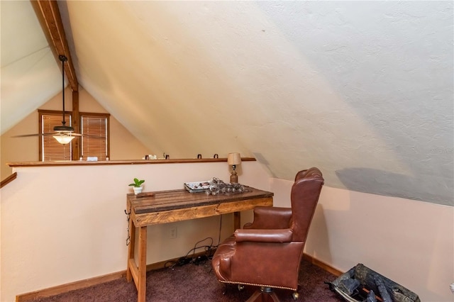 interior space featuring vaulted ceiling with beams and ceiling fan