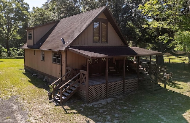 view of front facade with covered porch and a front yard