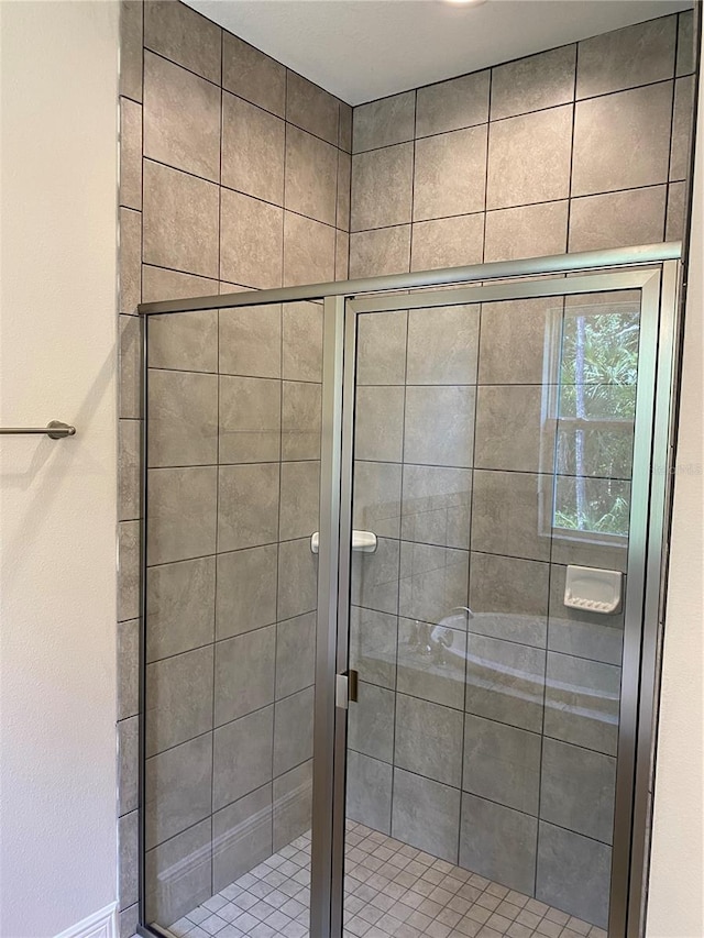 bathroom with an enclosed shower