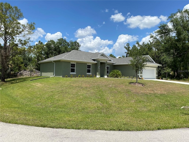 ranch-style home with a front yard and a garage