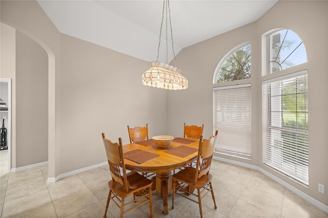 dining space with light tile patterned floors