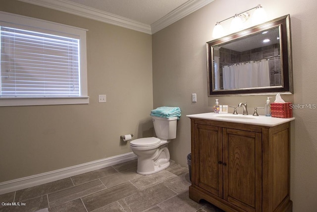 bathroom featuring crown molding, toilet, vanity, and a shower with shower curtain