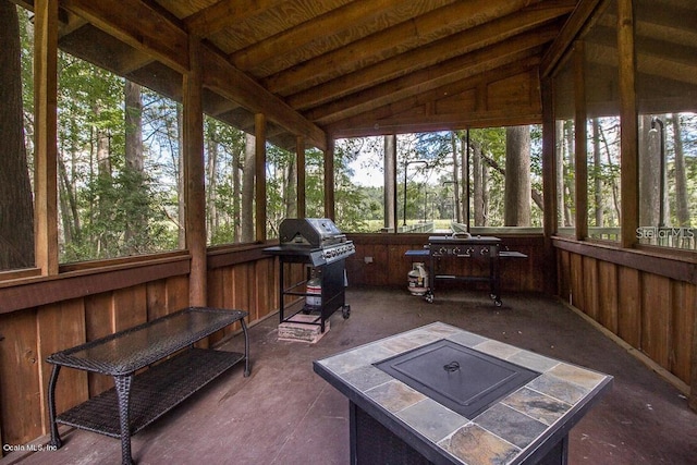 sunroom with vaulted ceiling