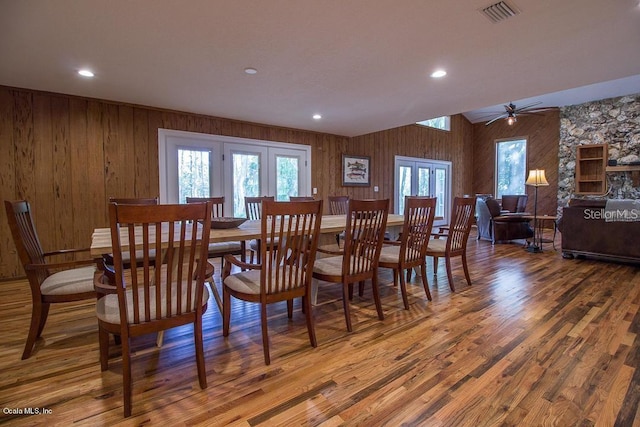 dining room featuring hardwood / wood-style floors and ceiling fan