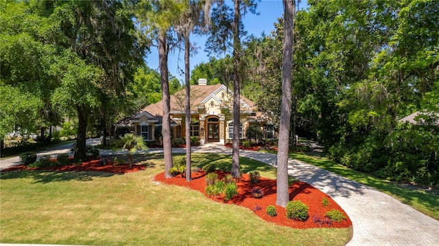 view of front of property with a front lawn