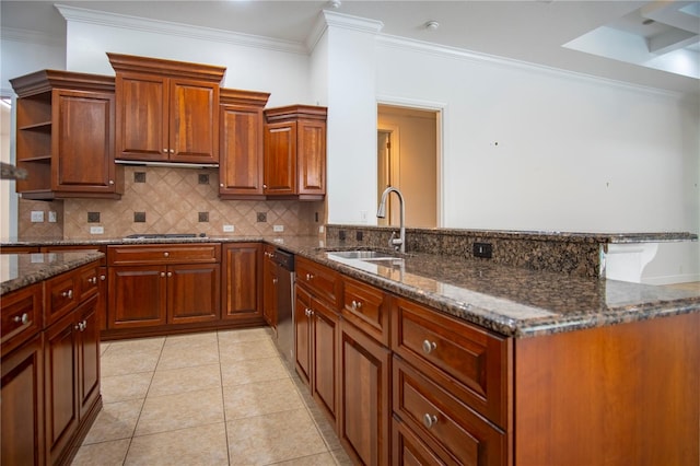 kitchen with crown molding, tasteful backsplash, dark stone counters, sink, and light tile floors